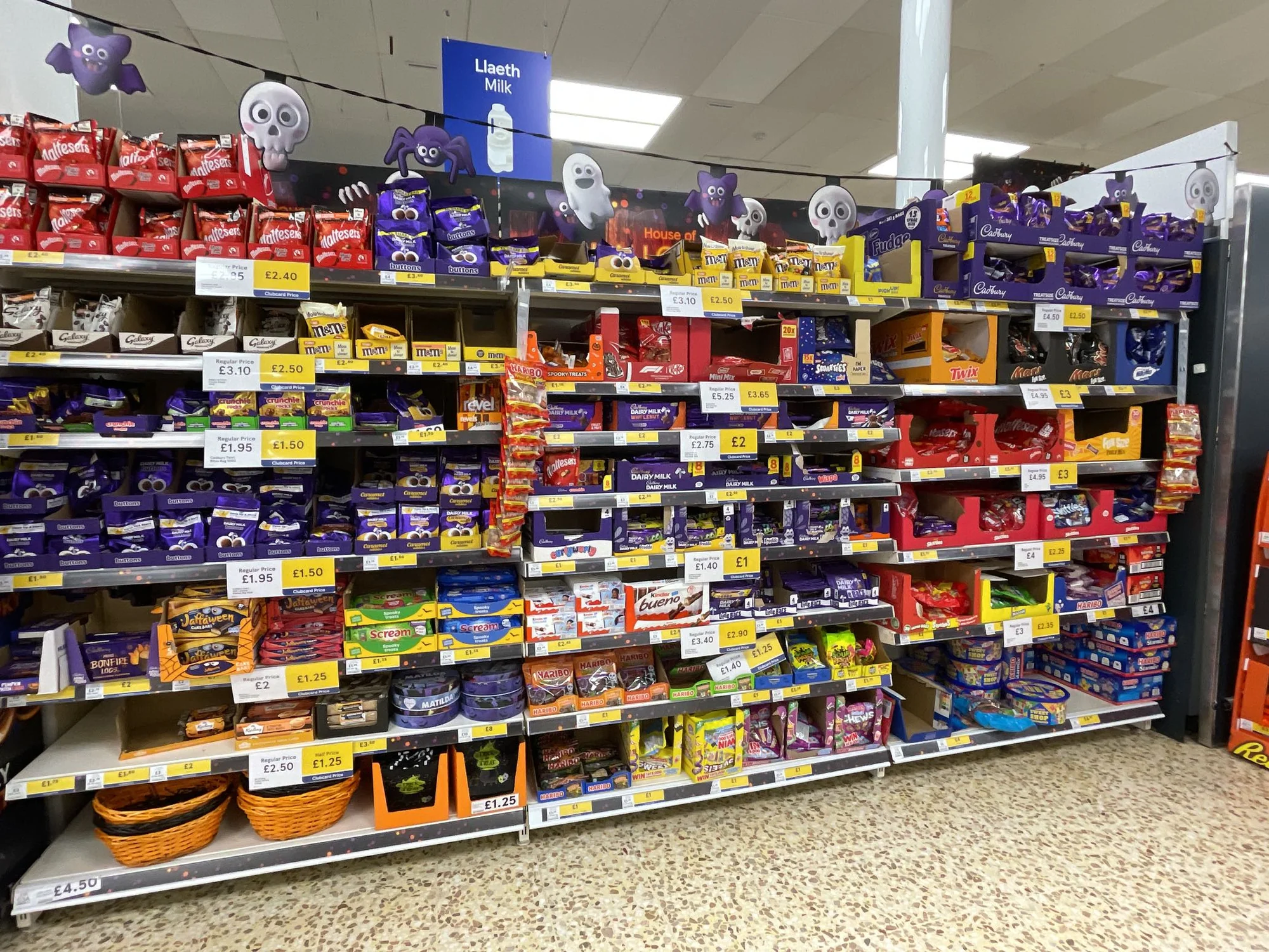 Halloween chocolate bay in a UK supermarket with Cadbury, Maltesers and M&M's